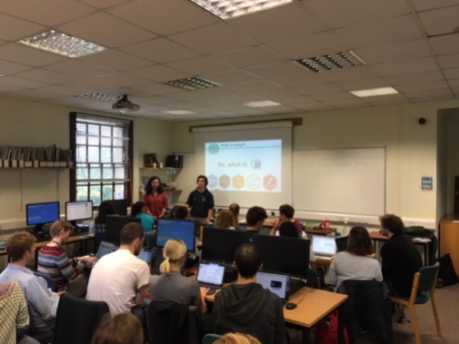 Sam and Claudia leading Coding Club in front of a room packed with people keen to learn R! https://ourcodingclub.github.io/